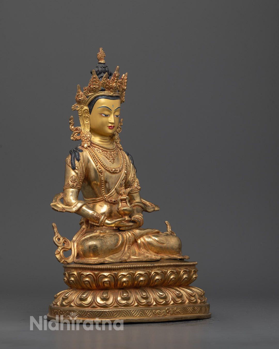 Side angle of Amitayus Tsepame Buddha statue holding nectar in dhyana mudra pose