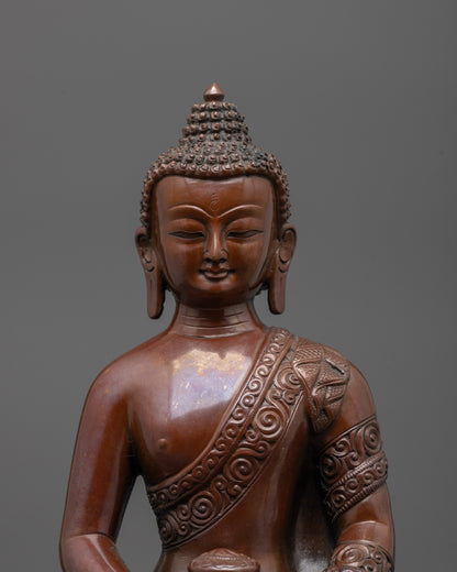 Close-up of Amitabha Buddha’s serene face with detailed oxidized finish
