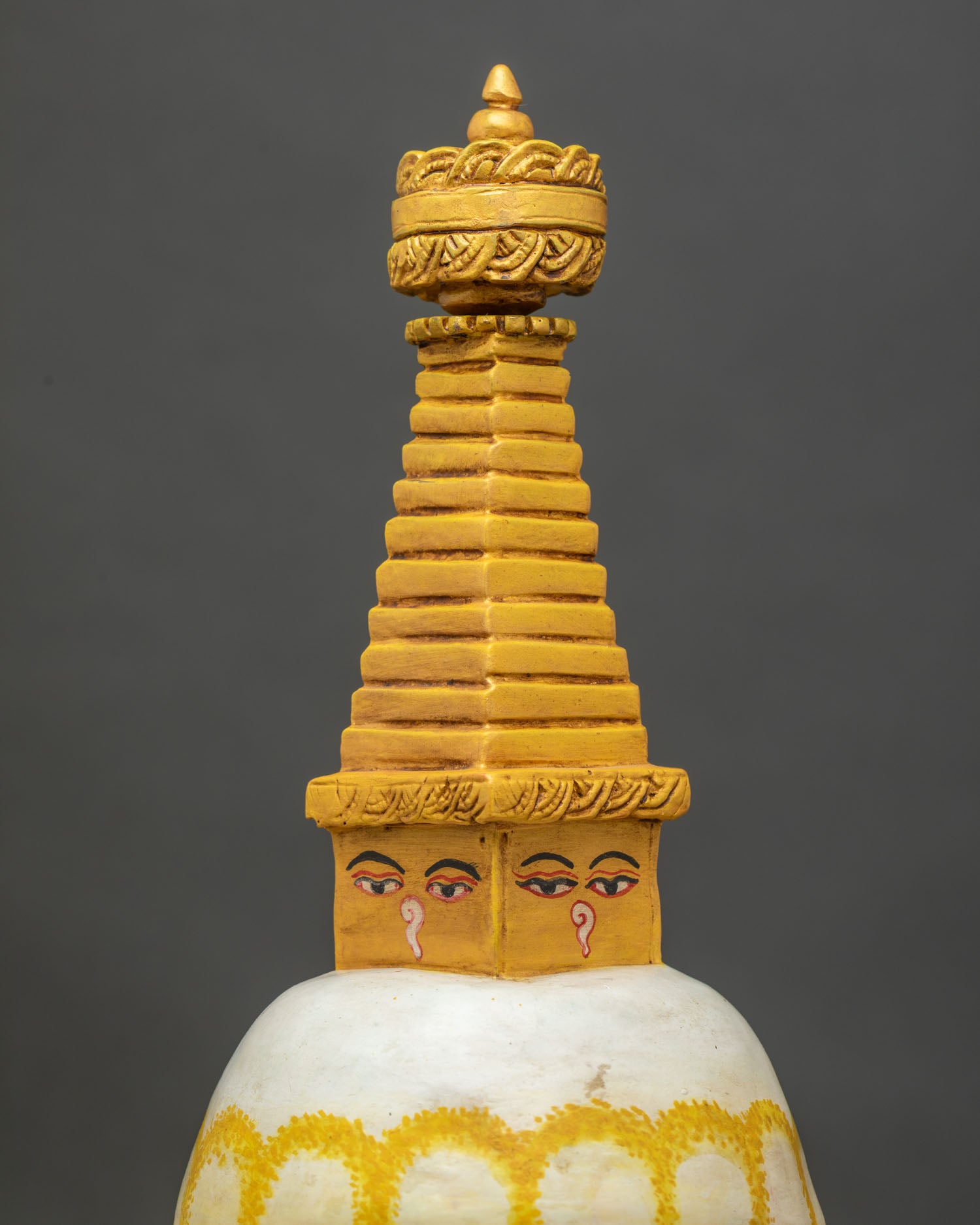 Angled full shot of Mini Boudha Stupa with vibrant hand-painted finish