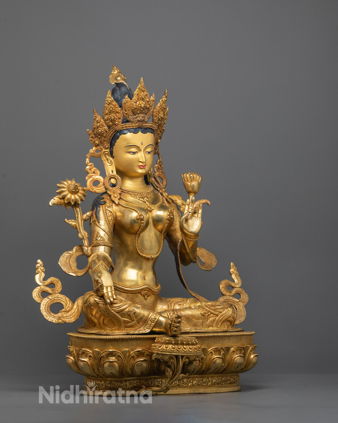 Angled shot of Green Tara Statue showing hollow chamber