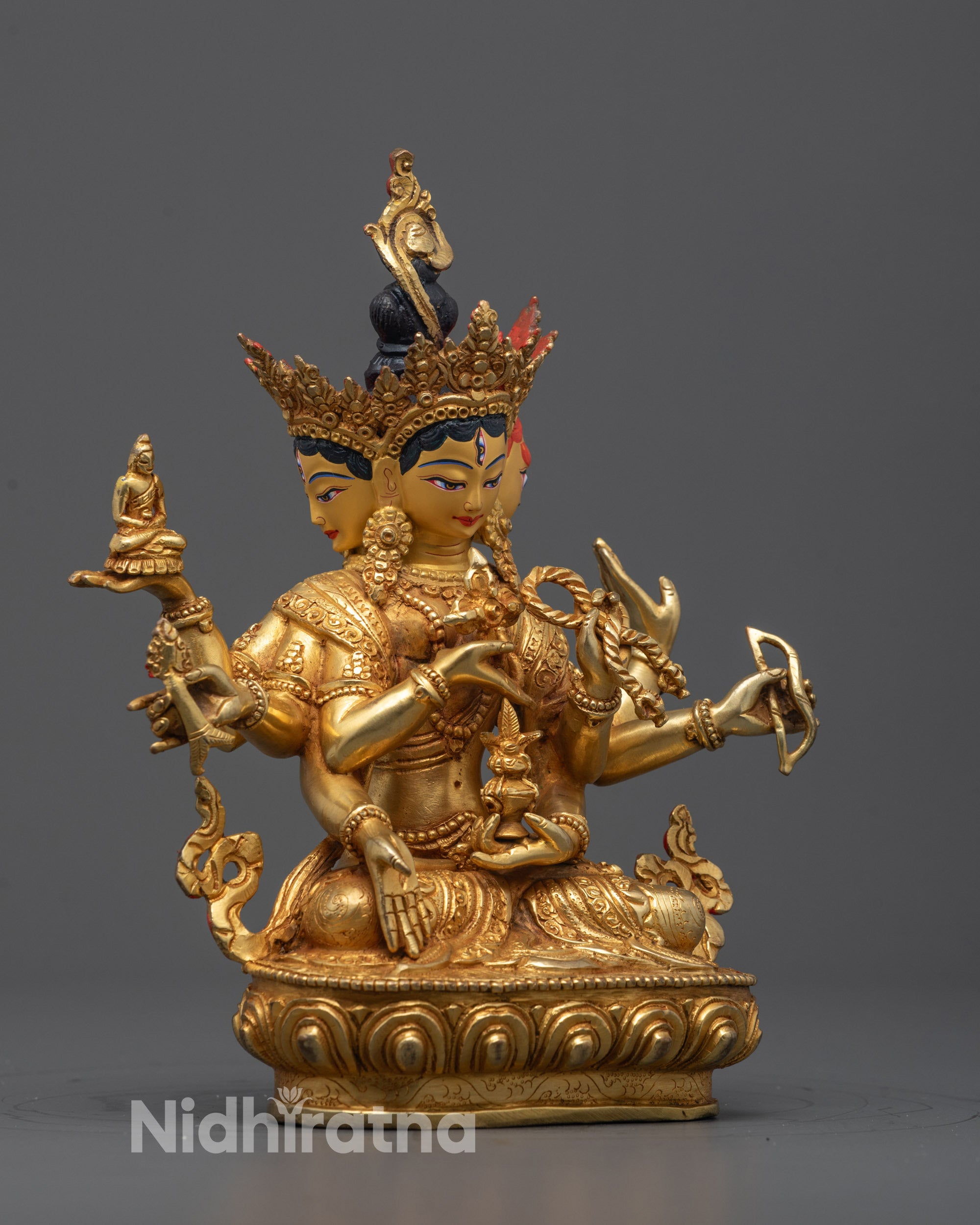 Angled side view of the Namgyalma Statue showing her elegant posture, flowing robes