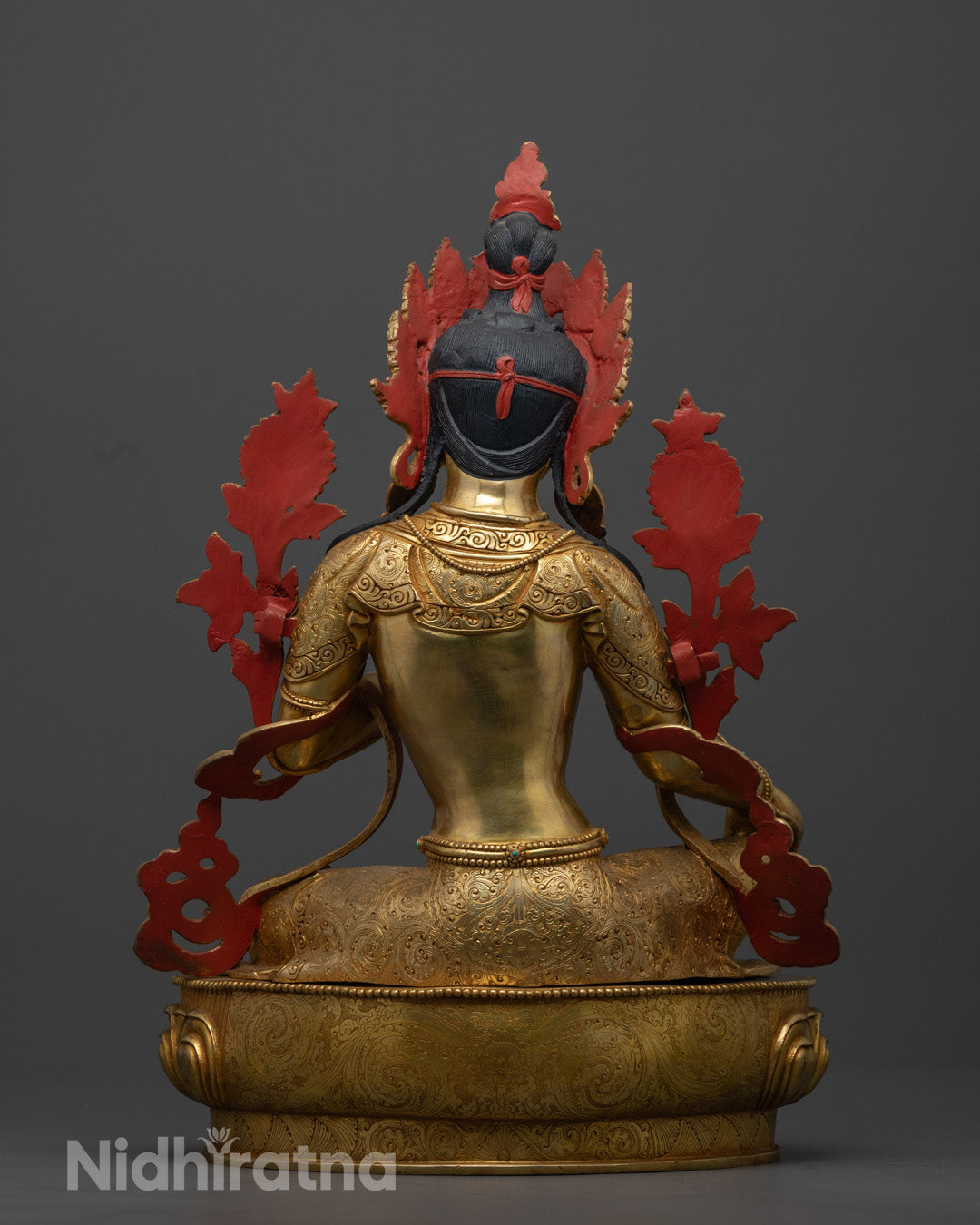 Artisan-crafted Green Tara statue placed in a peaceful meditation space, radiating spiritual energy and compassion