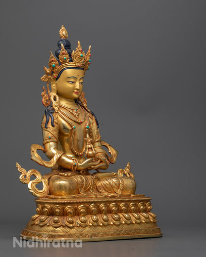 Artisan from Nepal skillfully crafting the Amitayus Statue using the traditional lost wax method in a workshop setting.