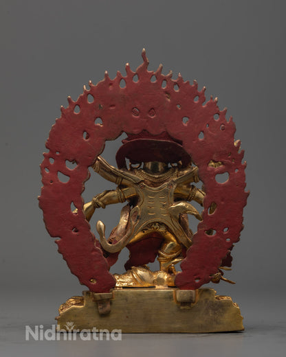 Artisan handcrafting the Six Armed Mahakala Statue using the lost wax method in Patan
