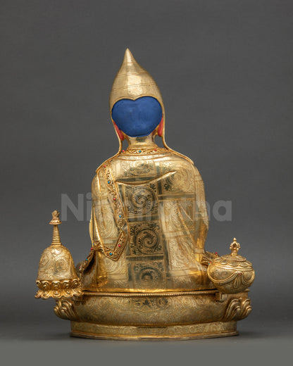 Atisha Statue back view showing carved robes and detailed Himalayan craftsmanship