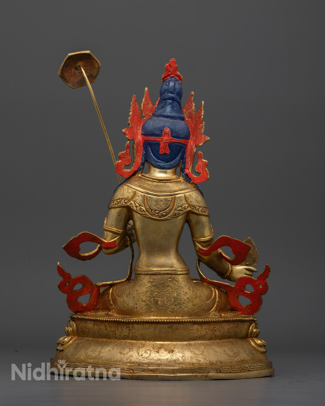 Authentic Dukar statue handcrafted by skilled Nepalese artisans using the traditional lost wax method, featuring intricate details on the robe, crown, and jewelry, with the deity holding a utpala flower