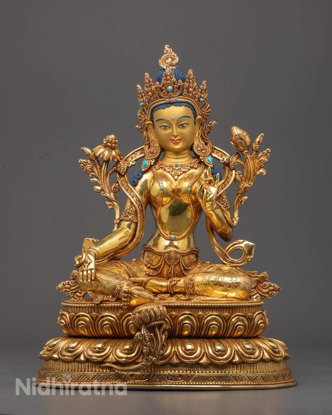 Authentic Green Tara sculpture with 24k gold-gilded face and fire-gilded body handcrafted using the lost wax method