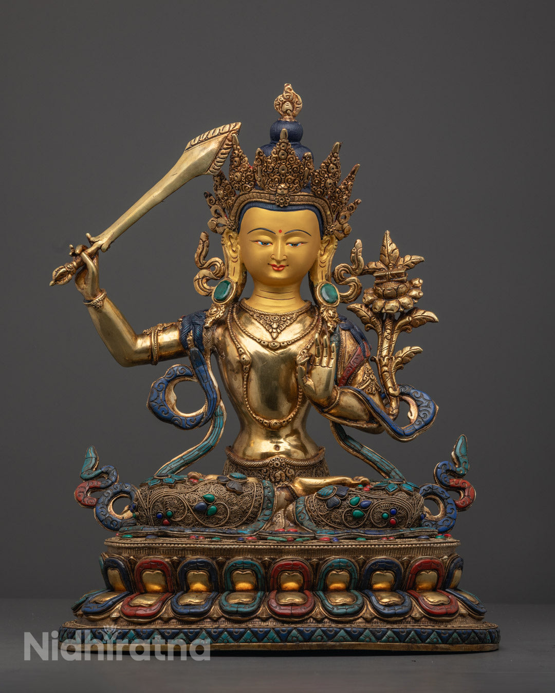 Authentic Manjushri Statue handcrafted with lost wax method, 24k gold-gilded face and adorned with turquoise, coral, and lapis lazuli – perfect for spiritual decor