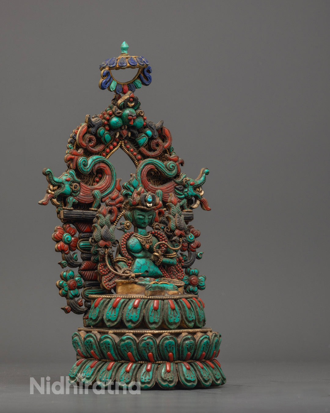 Authentic Nepalese Green Tara sculpture highlighting exquisite craftsmanship and radiant precious stone body