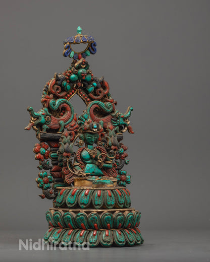 Authentic Nepalese Green Tara sculpture highlighting exquisite craftsmanship and radiant precious stone body