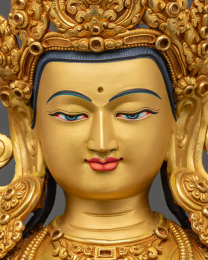 Avalokiteshvara statue detailed face close up gold-gilded features