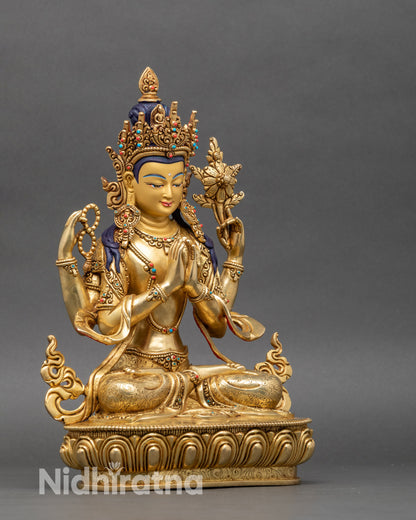 Avalokiteshvara statue right side showing one arm position and floral carved details