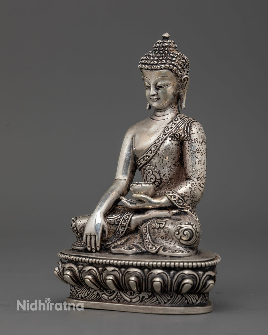 Silver Illumination: The Tranquil Aura of Shakyamuni Buddha