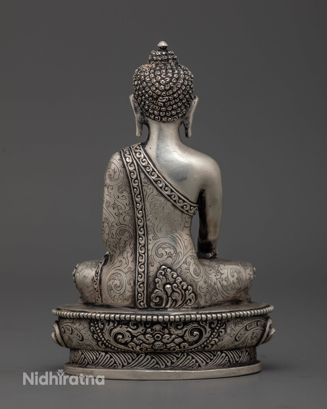 Silver Illumination: The Tranquil Aura of Shakyamuni Buddha