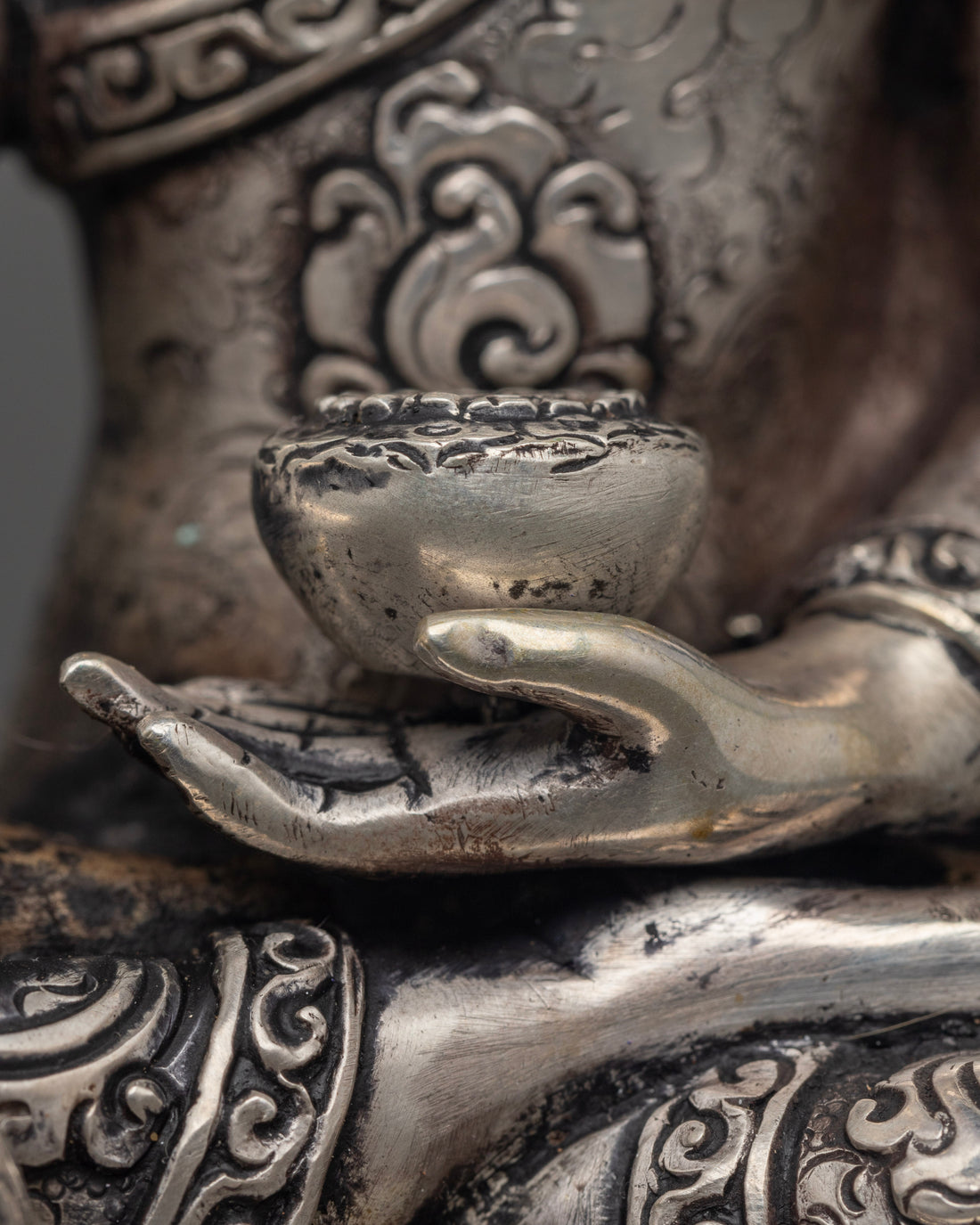 Silver Illumination: The Tranquil Aura of Shakyamuni Buddha