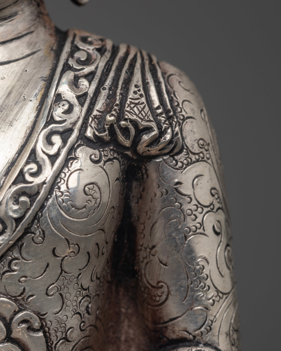 Silver Illumination: The Tranquil Aura of Shakyamuni Buddha