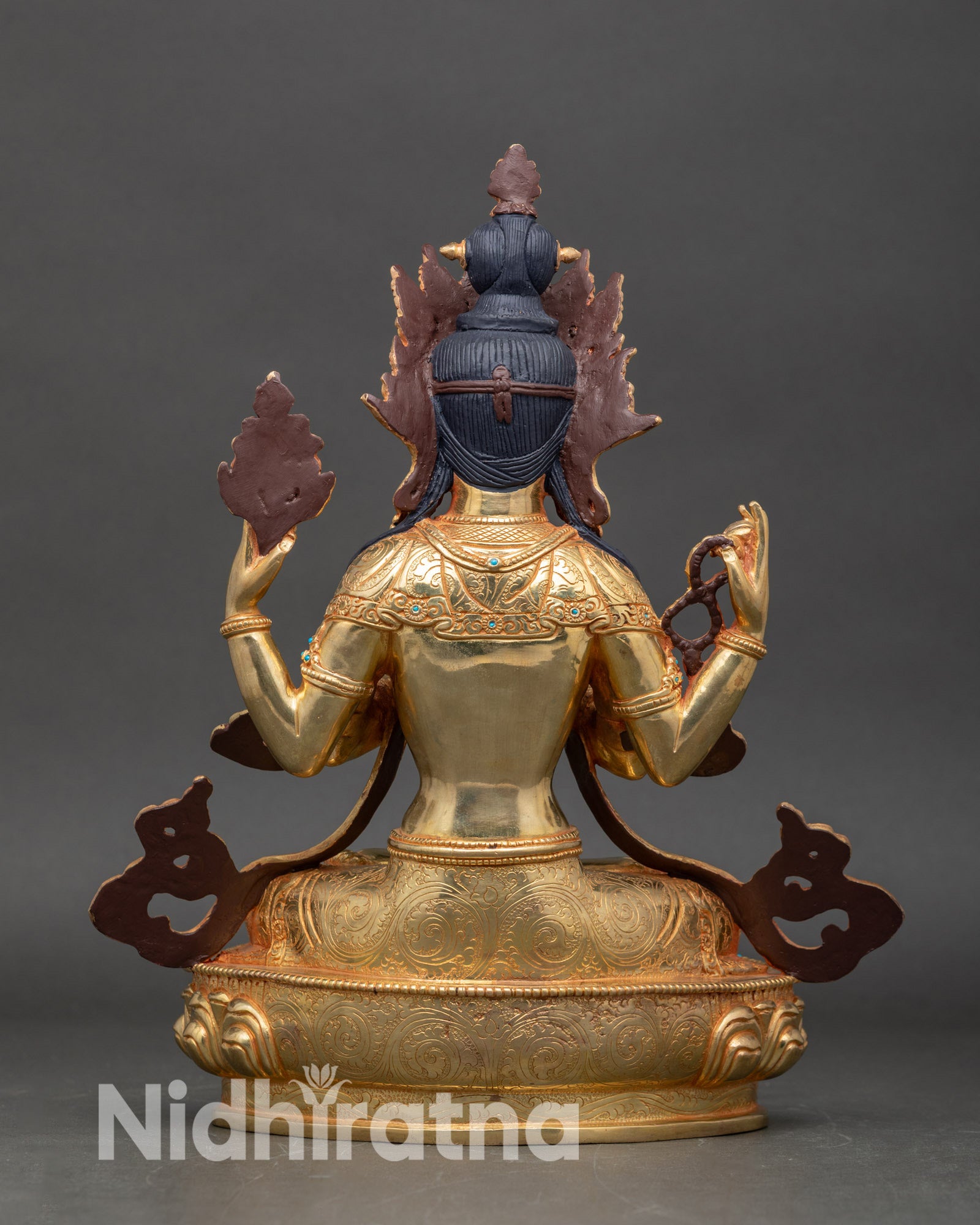 Back view of Chenrezig statue with detailed lotus throne gold gilded copper Buddhist art