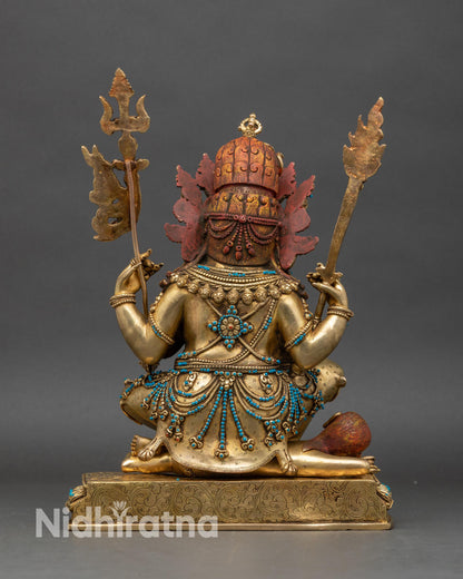 Back view of Four-Armed Mahakala Statue, lotus seat and ornate traditional detailing