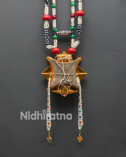 Back view of Ghau Mala gold plated beads engraved details handmade Tibet spiritual art