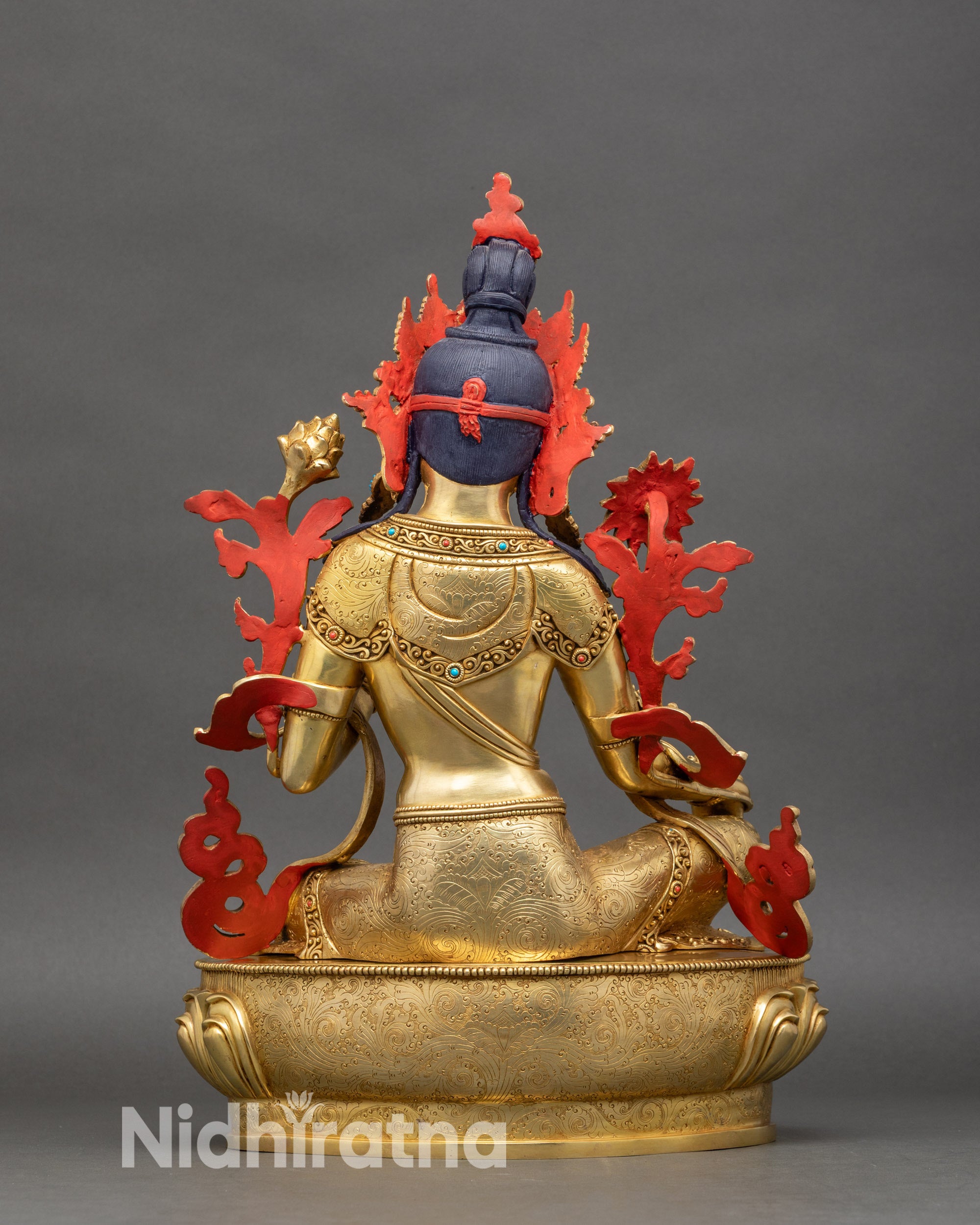 Back-view-Green-Tara-statue-intricate-robes-Himalayan-sacred-art-compassionate-deity