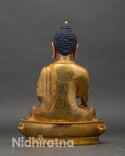 Back view of Shakyamuni Gautam Buddha Statue showing detailed robe and lotus pedestal design