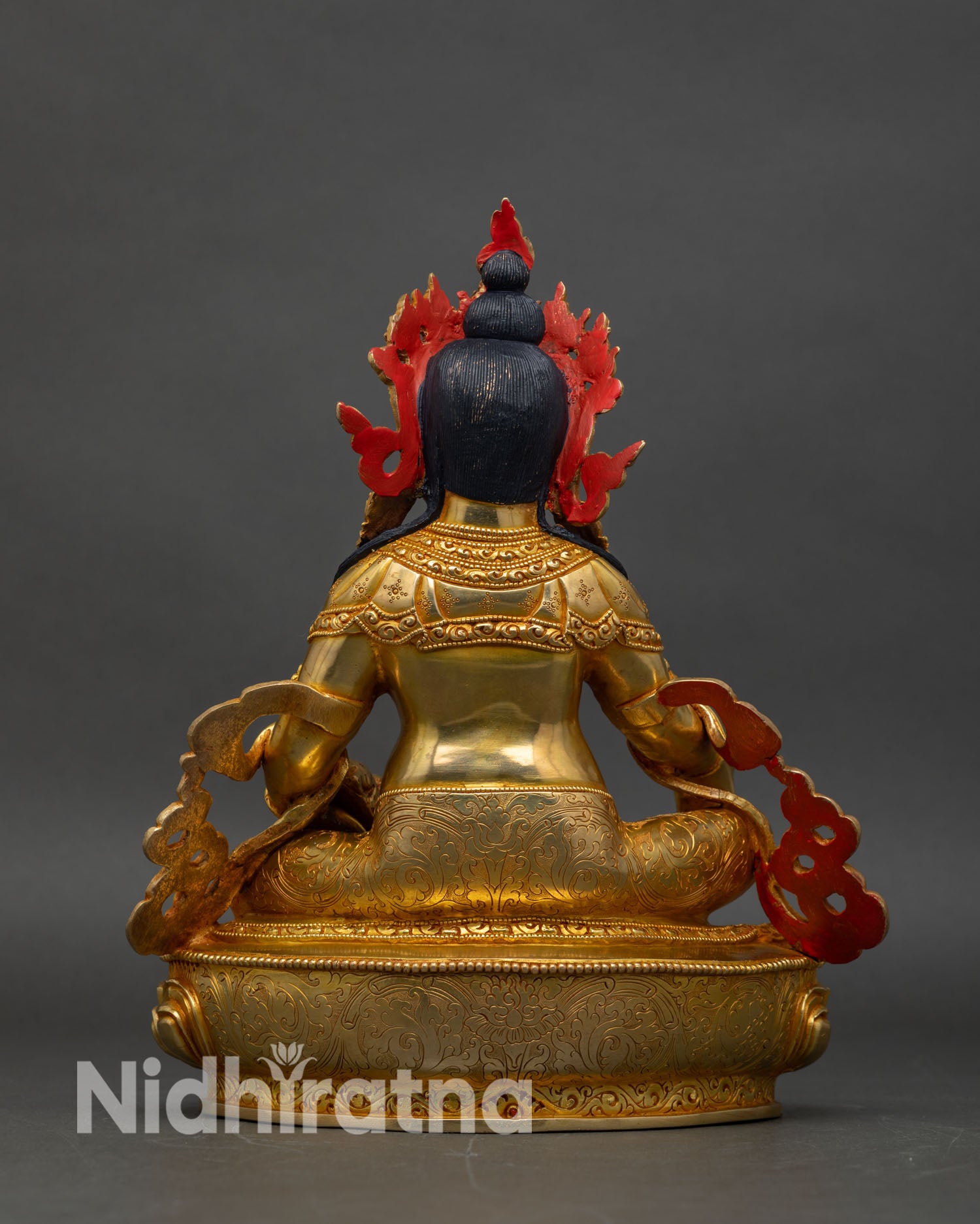 Back view of Dzambhala Statue hand-set coral turquoise stones intricate Nepalese Buddhist sculpture