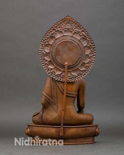 Back view of Ratnasambhava Buddha statue, lost-wax casting, detailed craftsmanship
