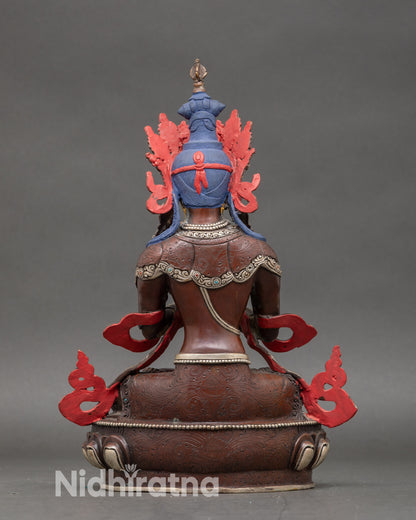 Back view of Vajradhara Buddha figurine, intricate Himalayan copper and gold detailing