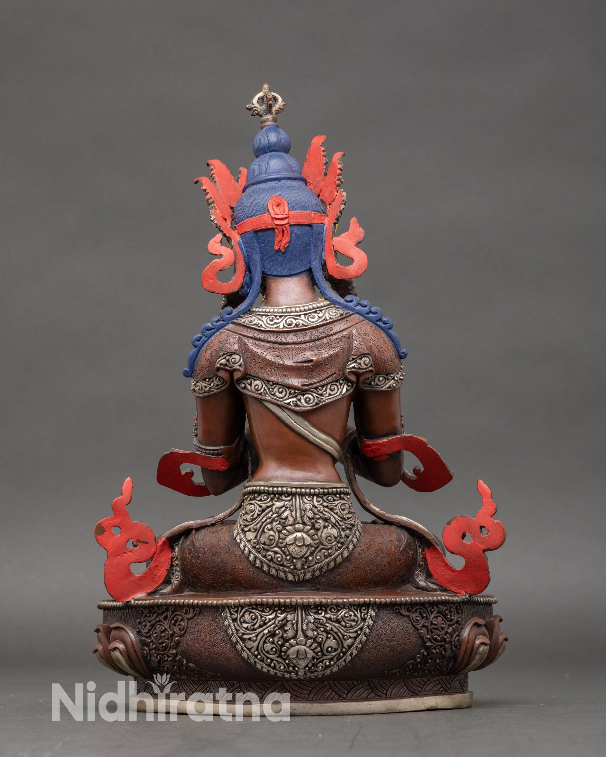 Back view of Vajradhara statue on lotus throne for devotional practice and altar display