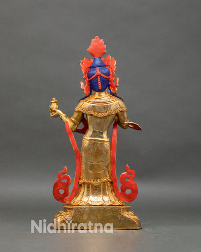Back view of Yeshe Tsogyal statue, engraved scarves and traditional Newar motifs