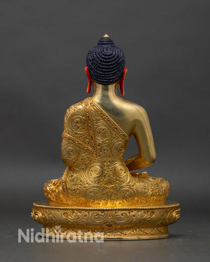 Back view of Amitabha Buddha statue, ornate lotus seat and repousse robe details