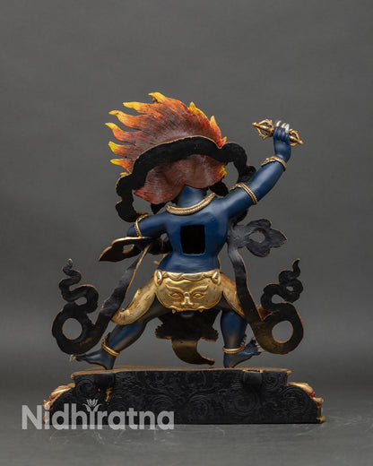 Back view of Vajrapani statue showing gold-gilded flaming aureole and tiger-skin garment
