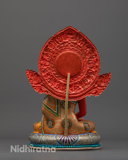 Back-view of Artisan-crafted Amitabha Buddha statue showing intricate golden halo