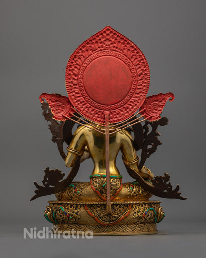 Back-view of Hand-carved Green Tara sculpture from Nepal symbolizing protection