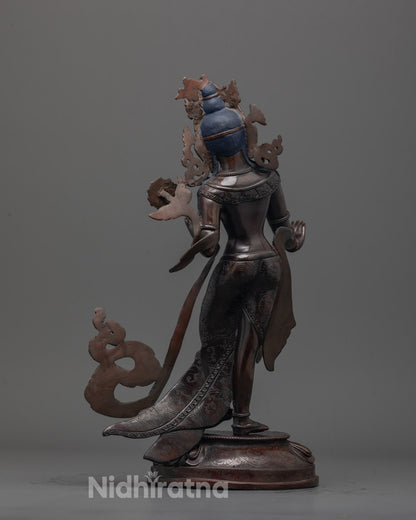 Back-view of Oxidized copper White Tara statue handcrafted in Patan, Nepal