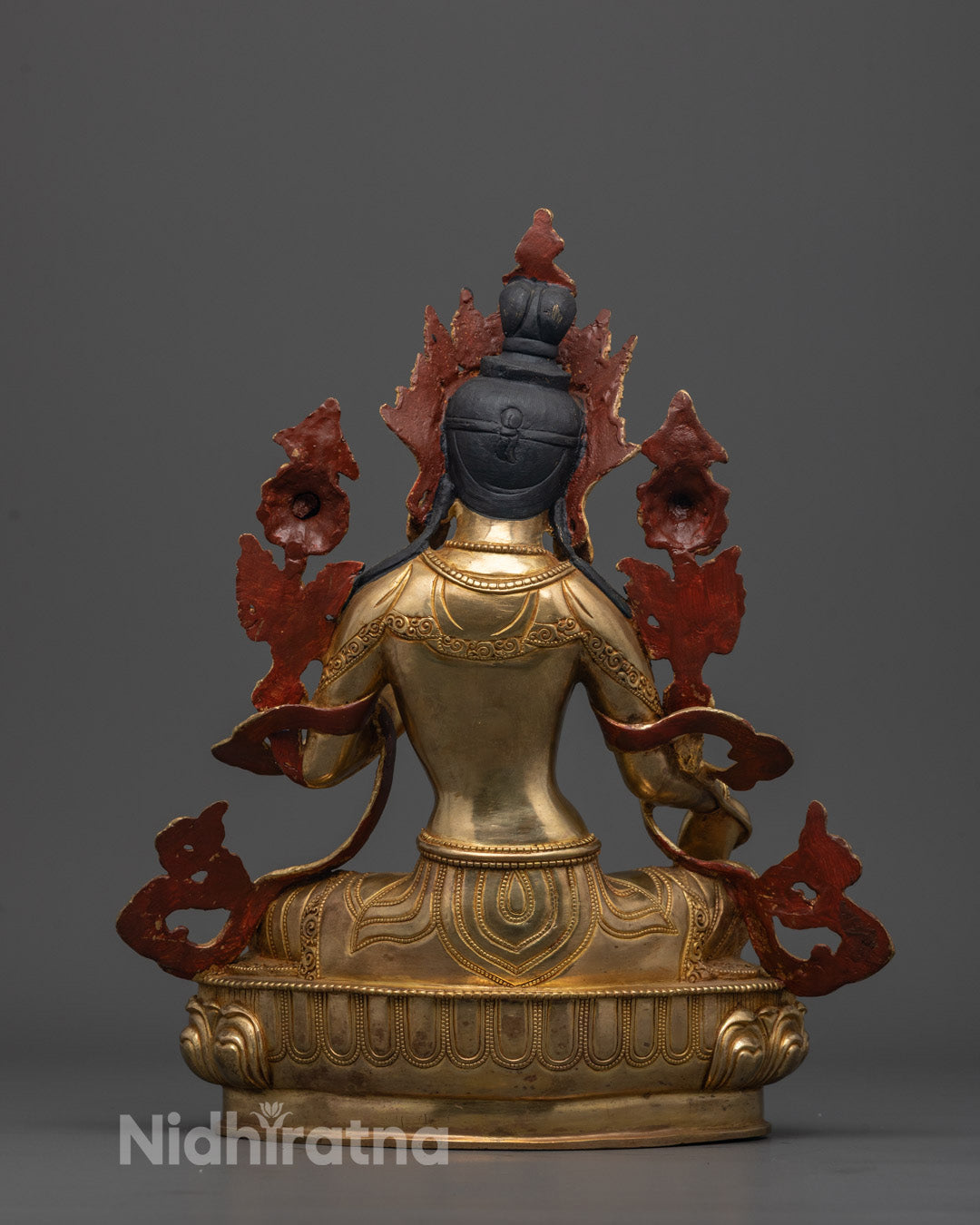 Back-view of Traditional copper-based Green Tara sculpture featuring sacred hollow chamber