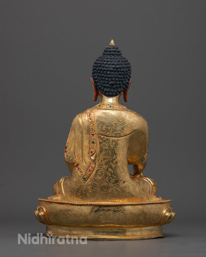 Back-view of a Traditional copper-based Shakyamuni Buddha sculpture 
