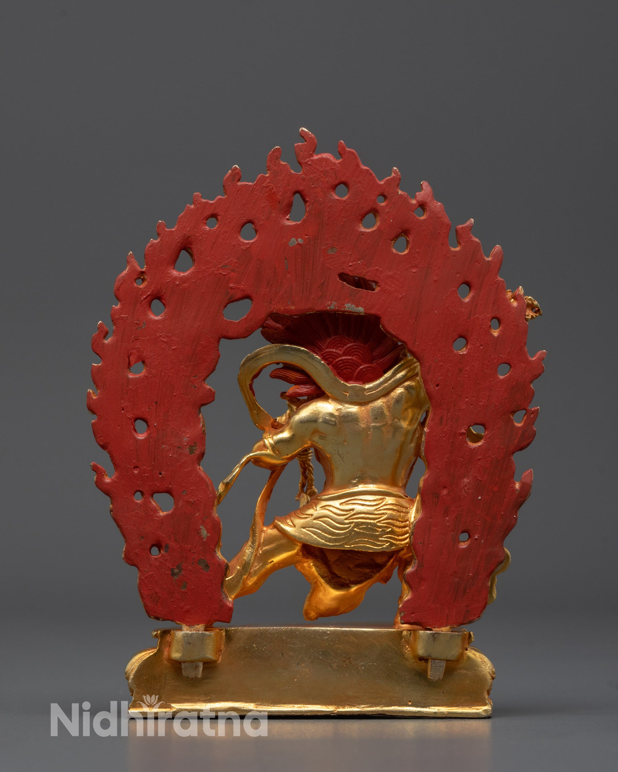 Back-view of Vajrapani face with intense gaze and symbolic accessories 