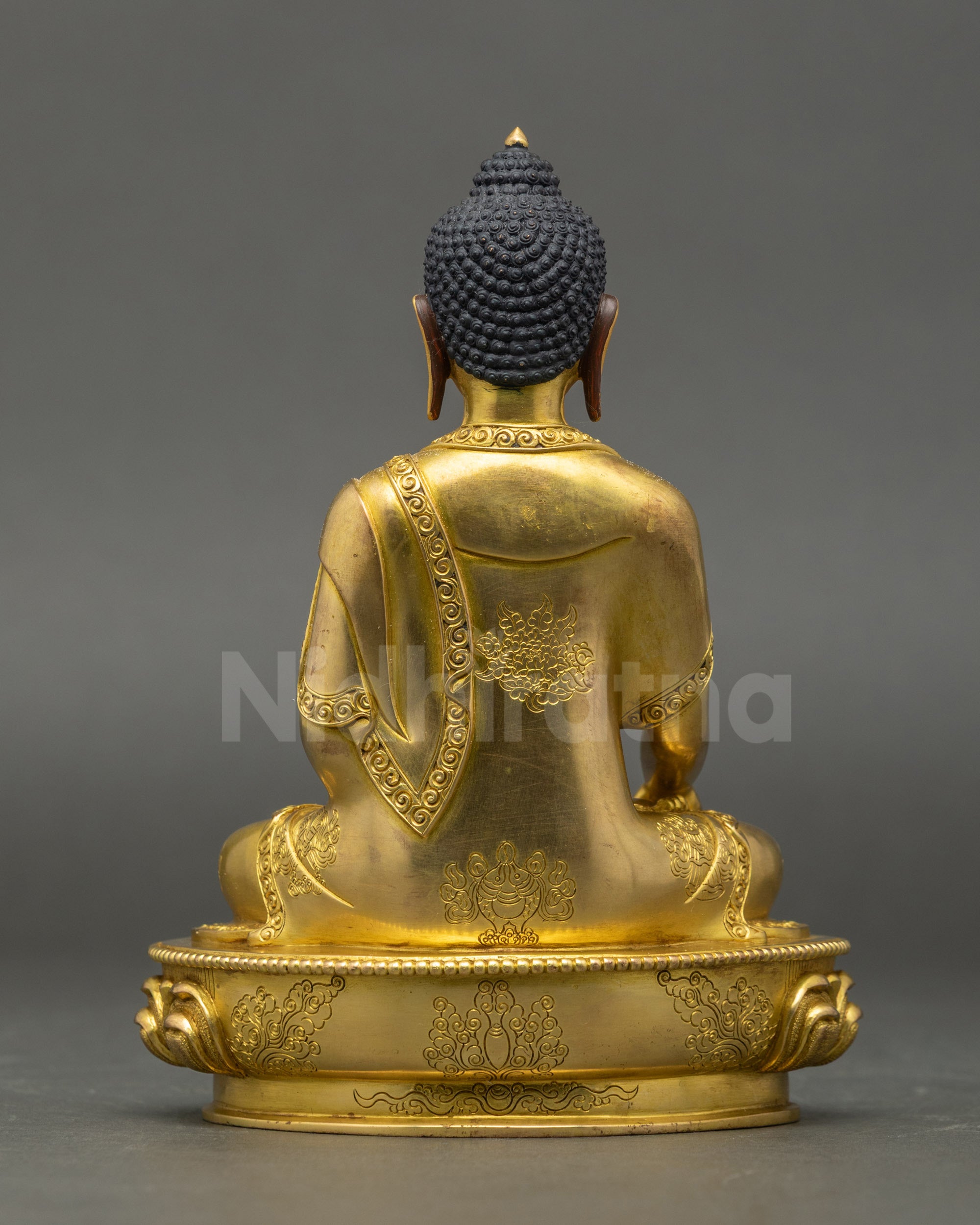 Back: Siddhartha Gautama Statue back view flowing robes gold-gilded Himalayan sculpture