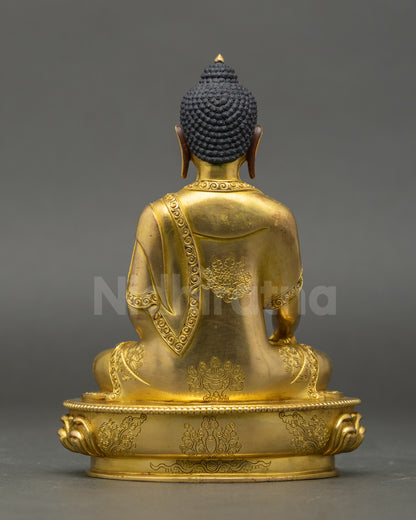 Back: Siddhartha Gautama Statue back view flowing robes gold-gilded Himalayan sculpture
