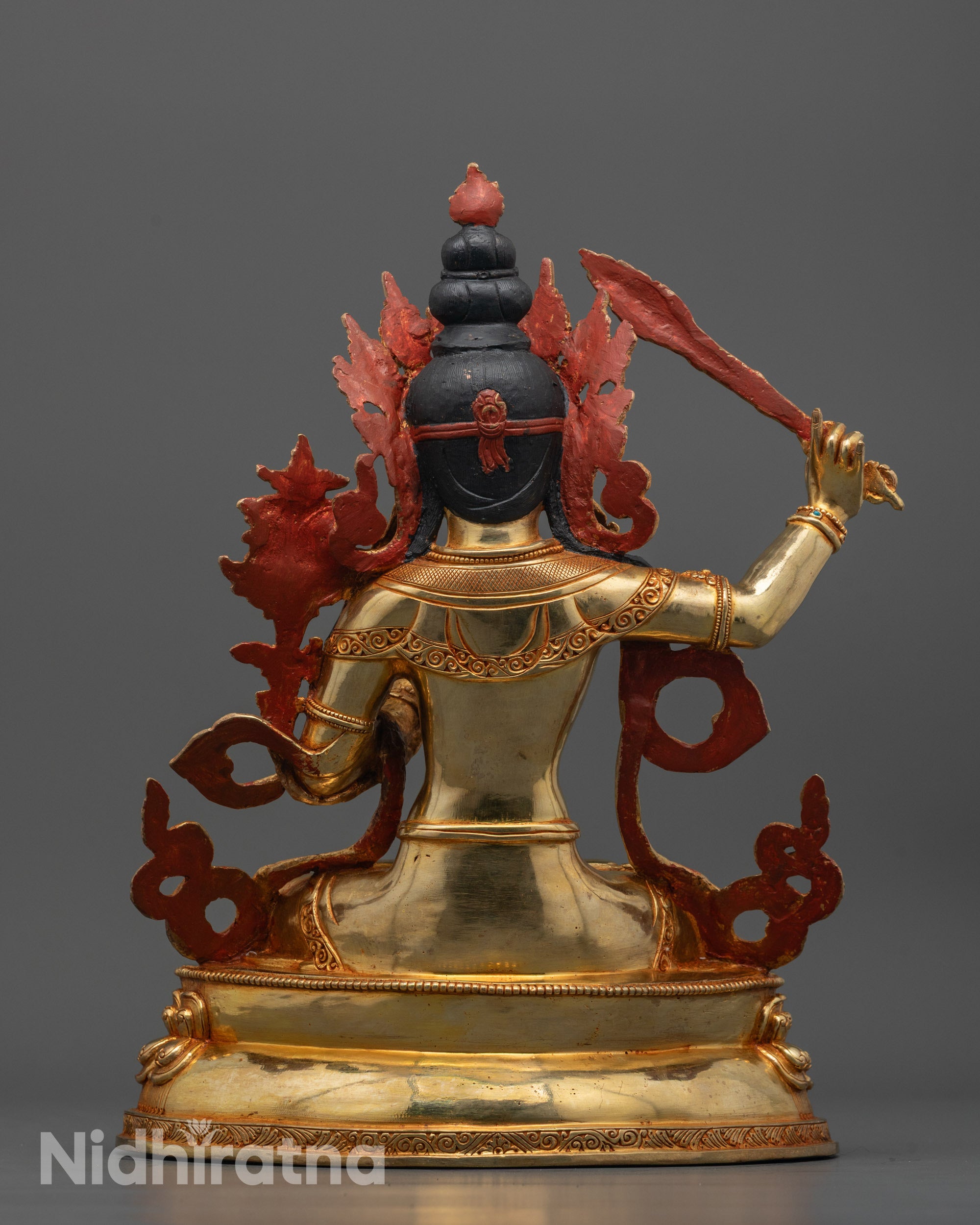 Back View of Manjushri Statue Featuring Intricate Halo and Robe Detailing