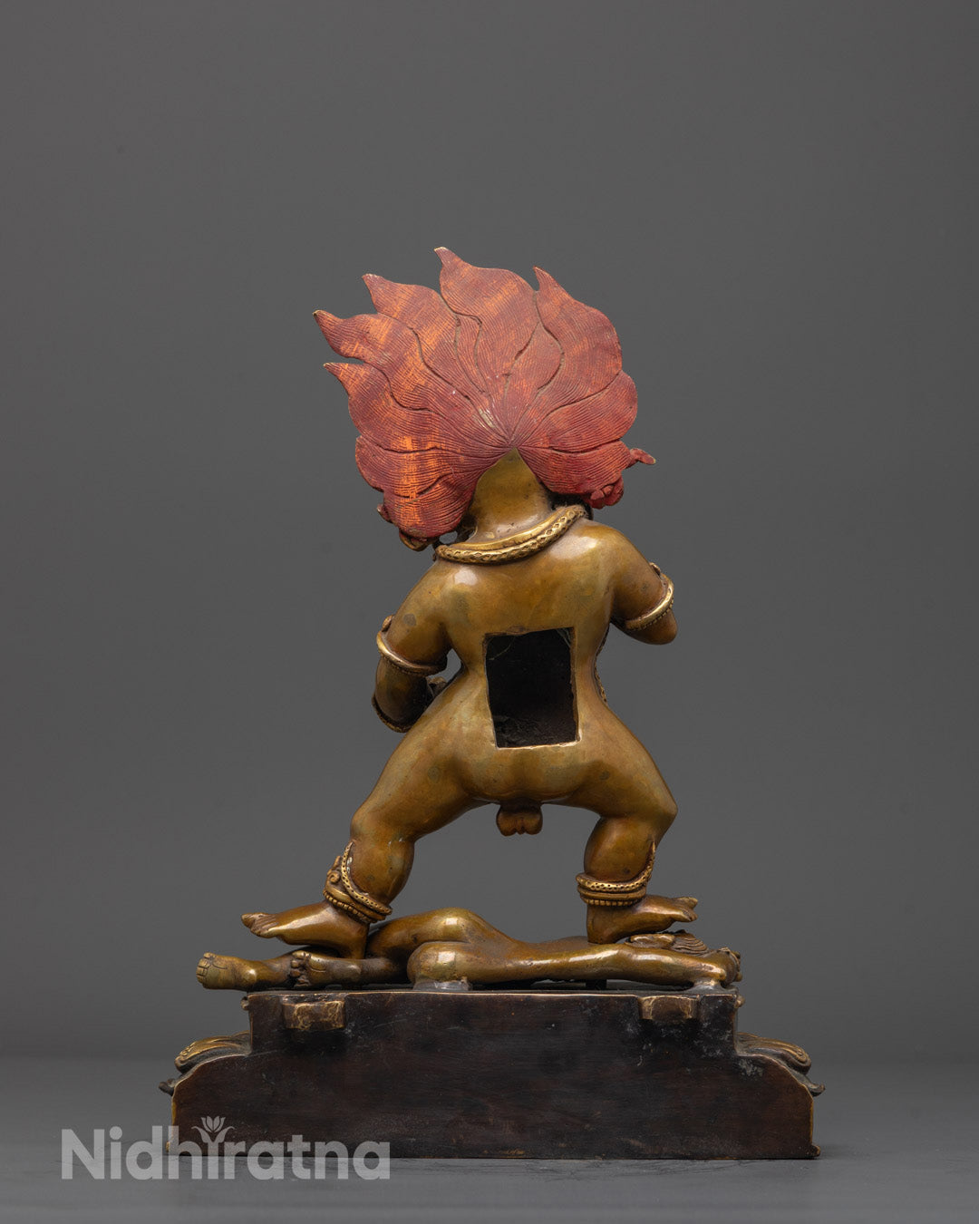 Back View of Oxidized Copper Black Dzambhala Idol Highlighting Sacred Chamber