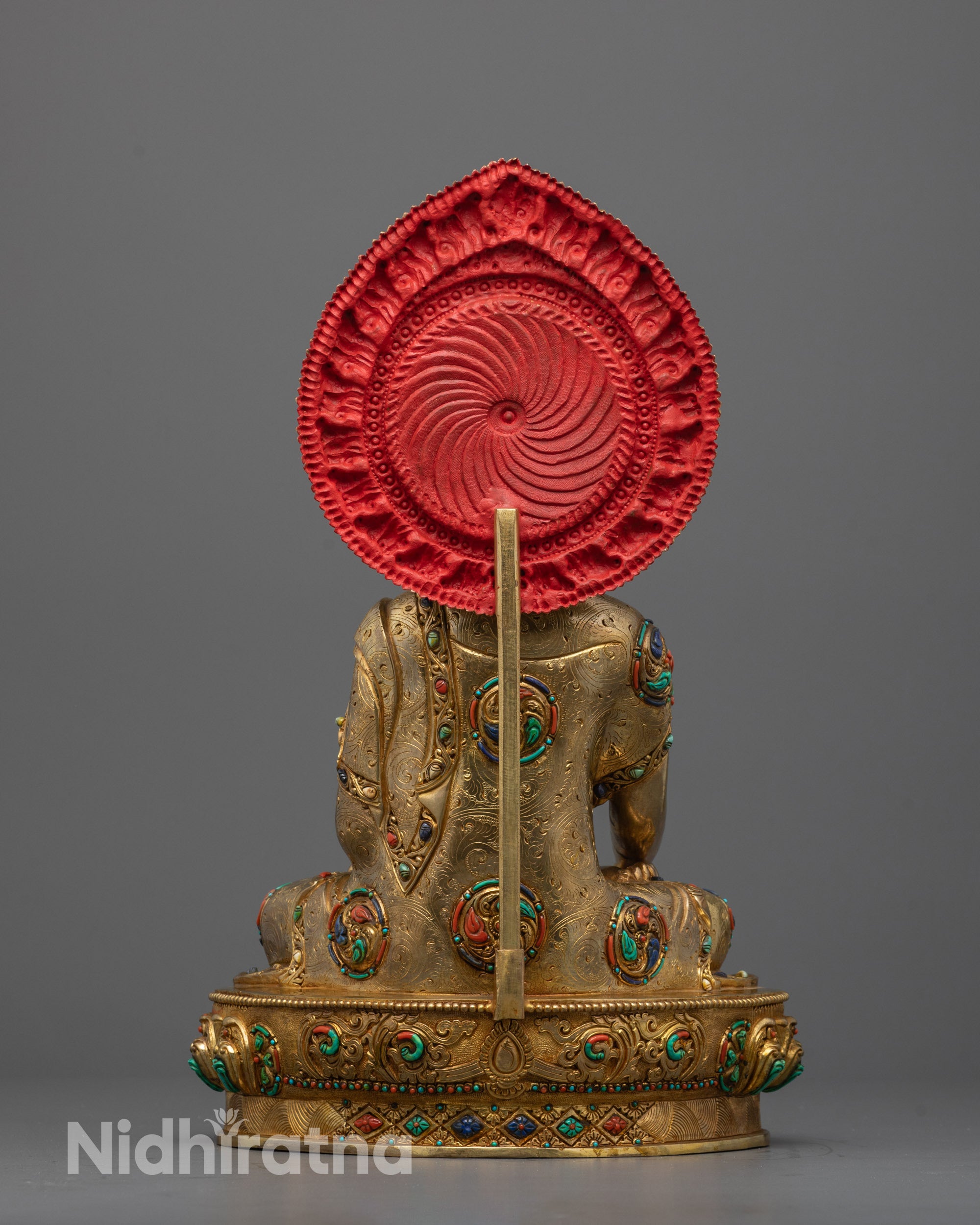 Back View of Shakyamuni Buddha Statue Showcasing Intricate Robe Details