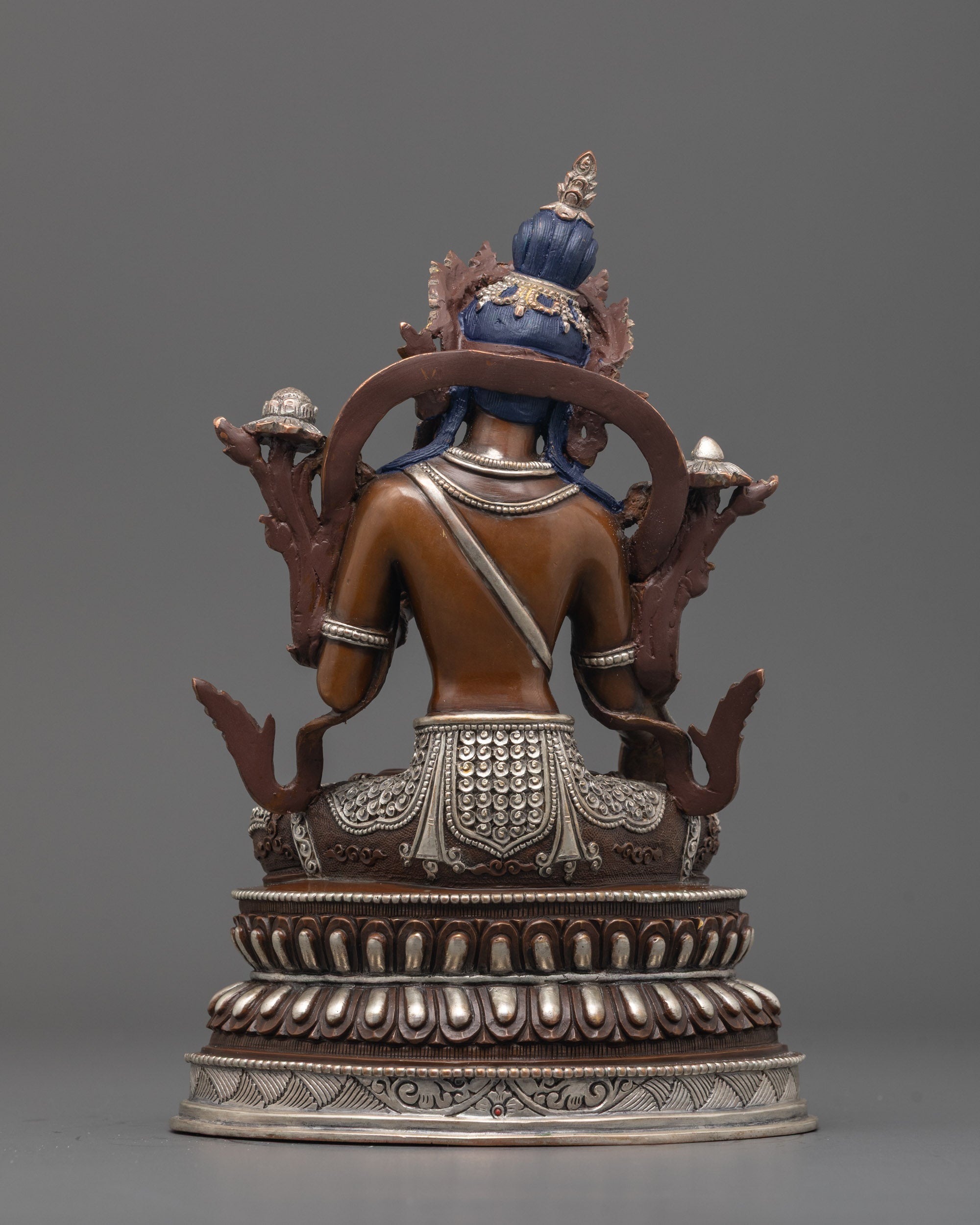 Back View of Traditional White Tara Statue Showcasing Silver Plating