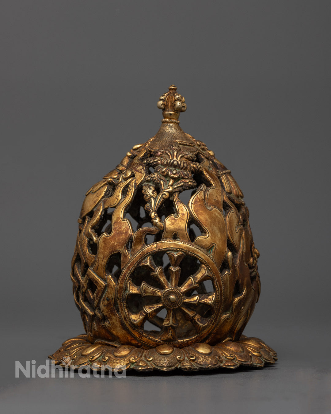 Back and bottom view of hanging incense burner showcasing ornate design work