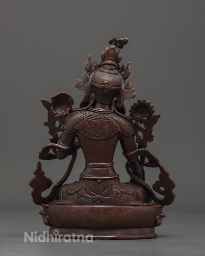 Back angle revealing intricate sacred symbols and craftsmanship of the Tibetan Buddhist White Tara statue