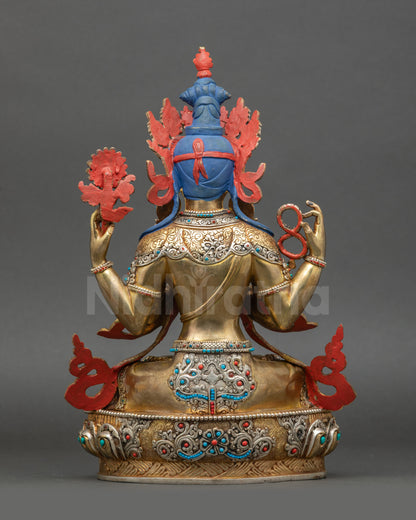 Back of Avalokiteshvara sculpture showing detailed carved robe and gold-gilding