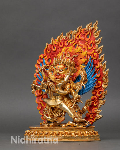 Back of Hayagriva statue with carved wings and decorative flaming halo