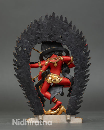 Back of Kurukulla Red Rigjema Statue showing halo of flames and skulls