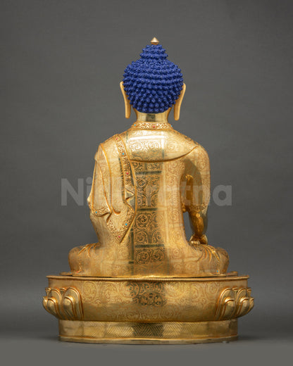 Back of Shakyamuni Buddha Statue showing ornate carvings, gilded layers, and lotus seat details